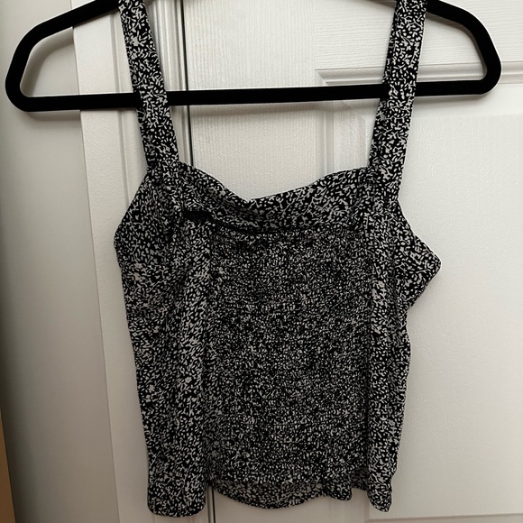 Black and white dynamite tank top. Loose fitted. Great condition. Only worn once - Picture 3 of 3
